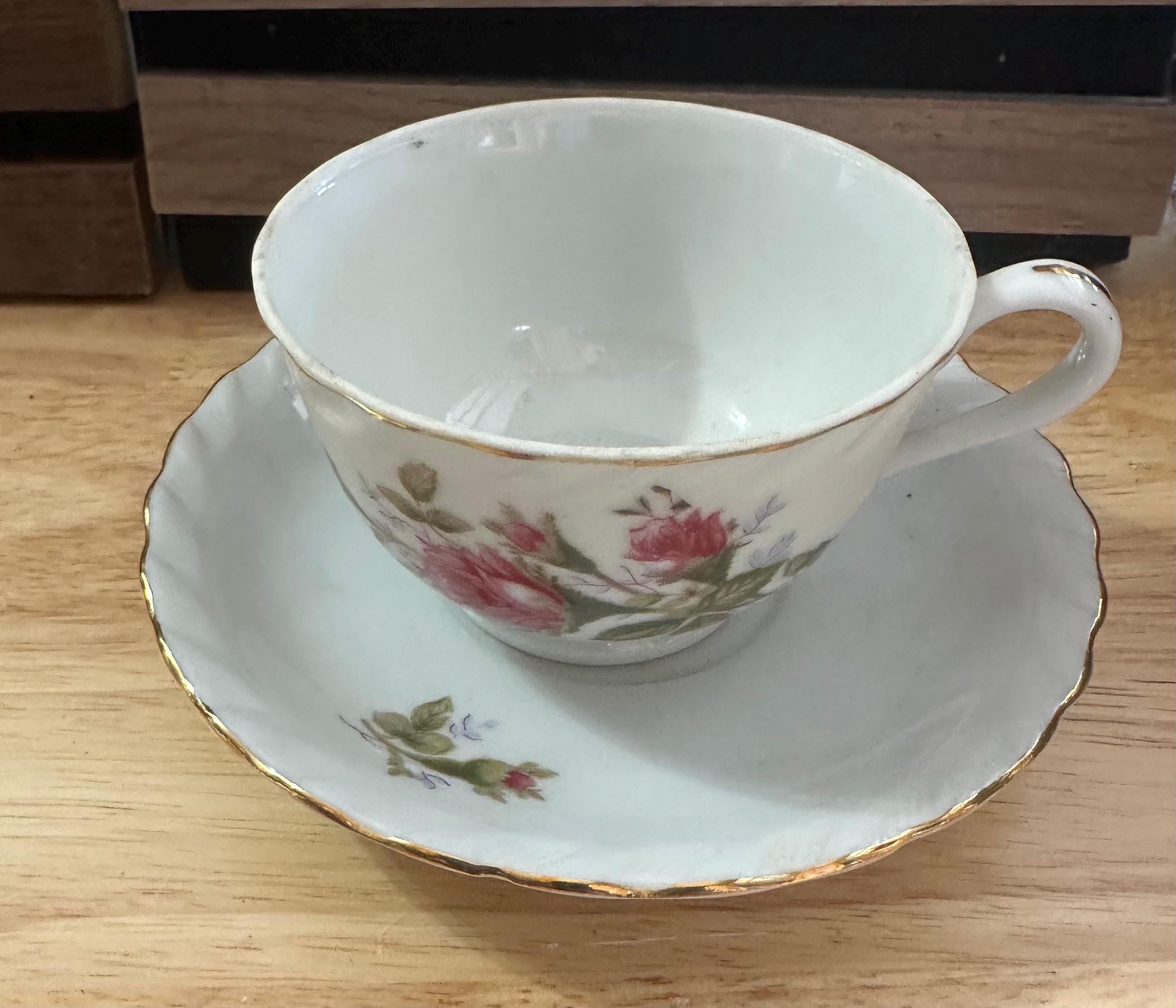 Royal Rose Fine China teacup and saucer