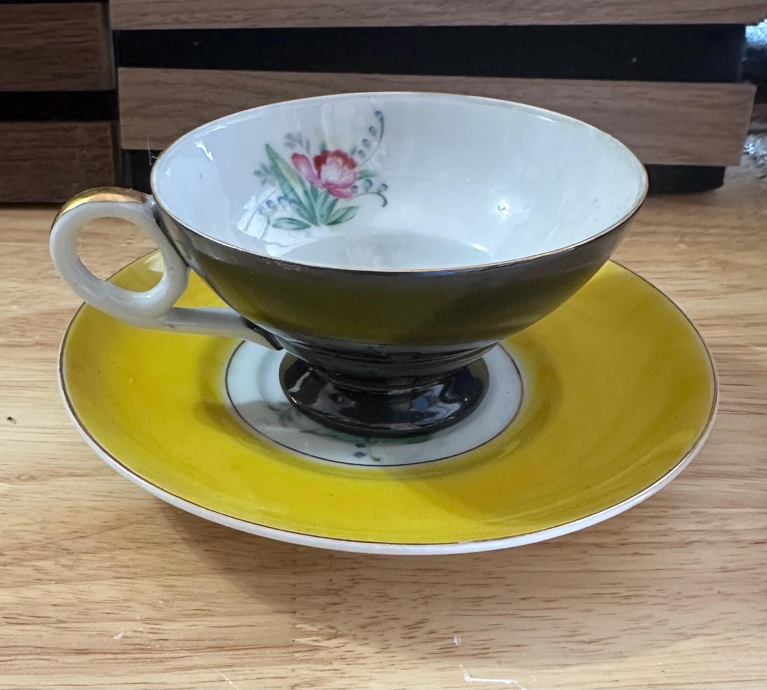 Vintage Trimont China  black porcelain teacup/saucer and yellow teacup/ saucer
