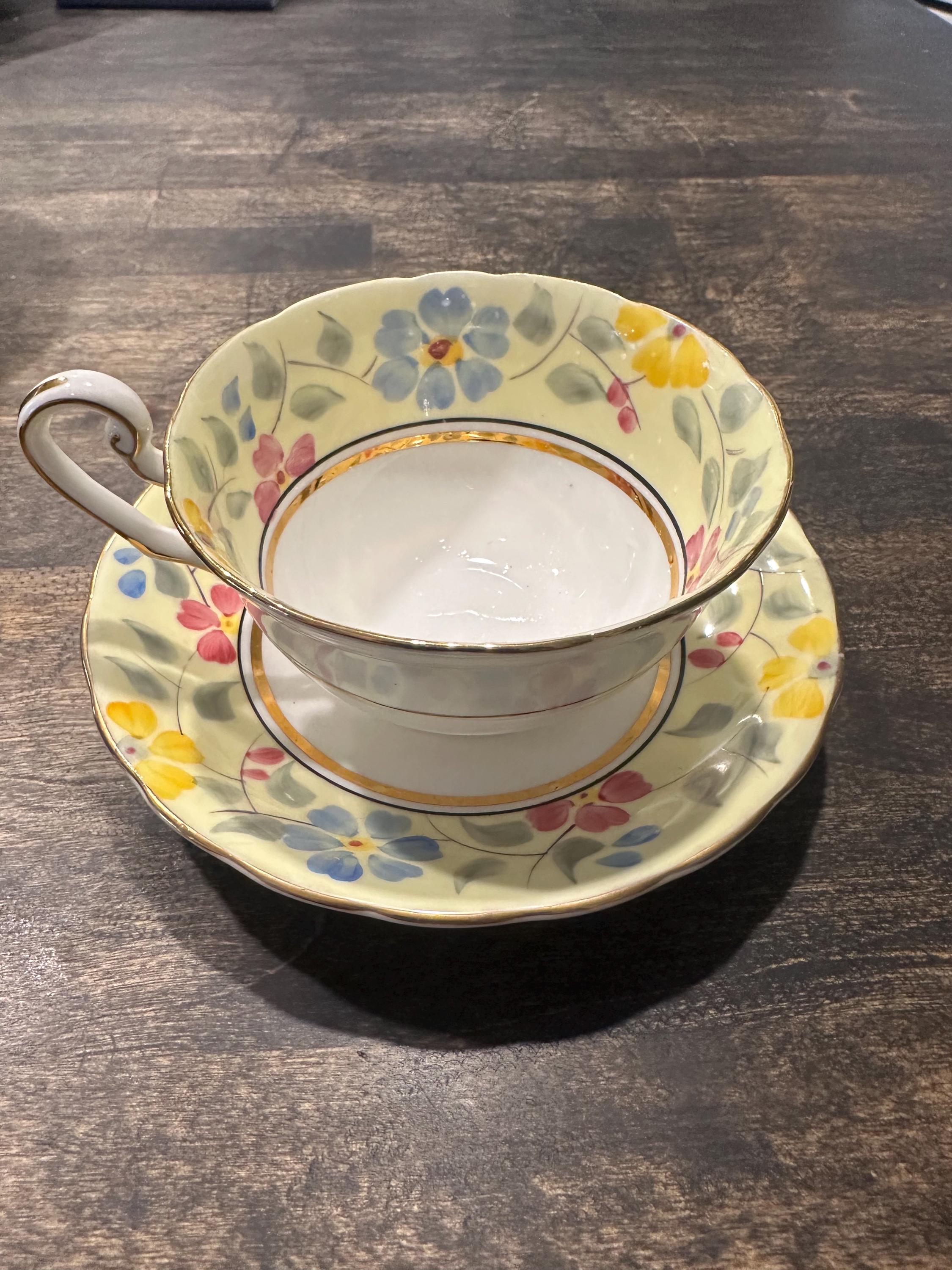 Vintage Victoria Bone China teacup and saucer